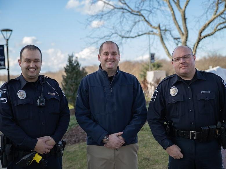 Three police officers standing